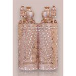 כיסוי לספר תורה מעוטר, בטקסטורת יהלומים, עם רקמה של מערת המכפלה וחיפוי כיפות כסף וזהב.